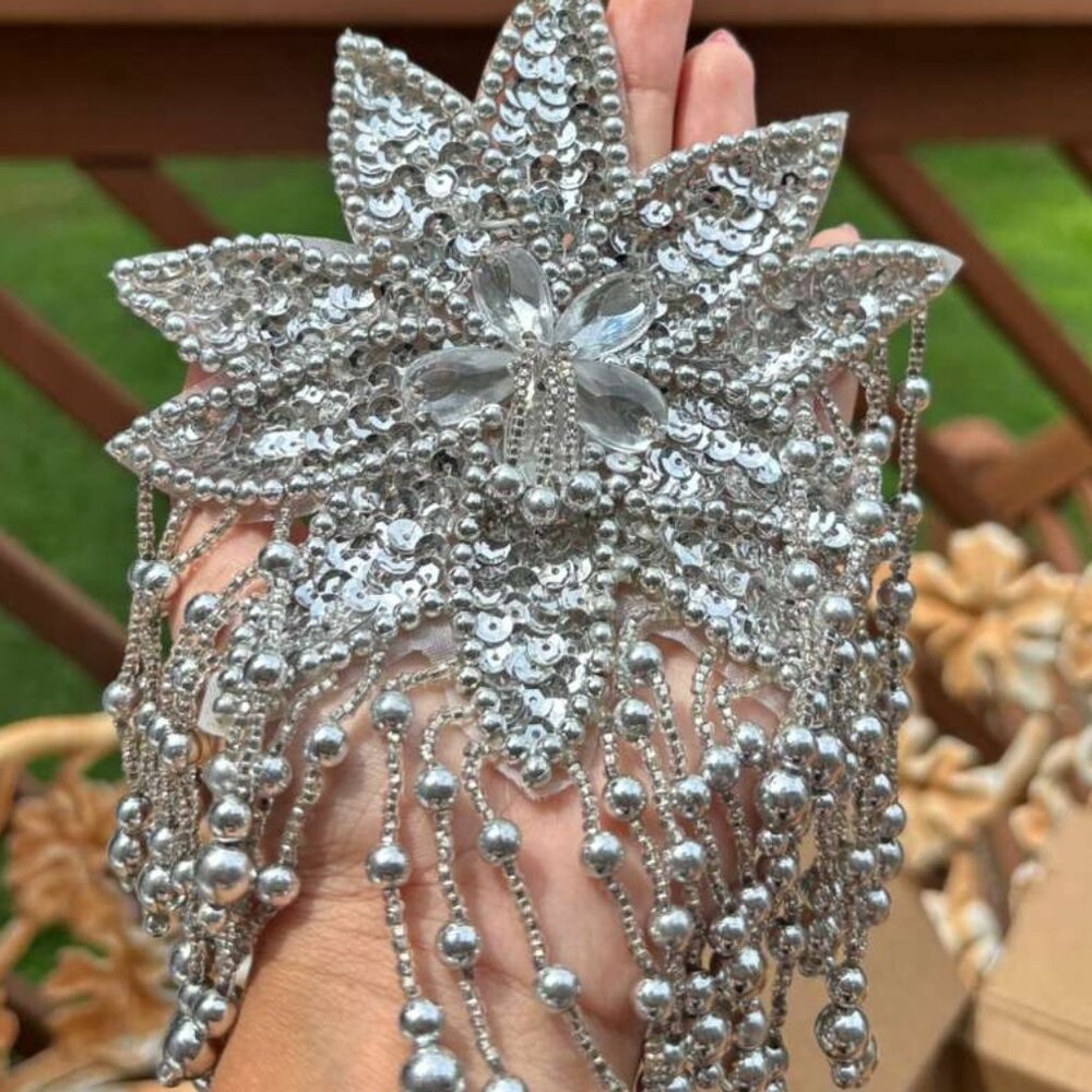 A MEGAS BROOCH OR A HOLIDAY STAR